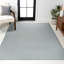 Tapis intérieur / extérieur rayé bleu / ivoire Ryandh High-Low Minimalist-88570905