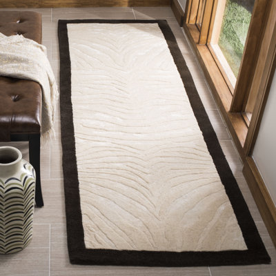 Christoper Hand Tufted Wool Animal Print Rug