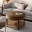 Table basse ronde moderne avec compartiment caché, tablette ouverte et pieds réglables-1321568312