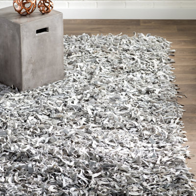 Godsey Handwoven Leather Solid Color Rug