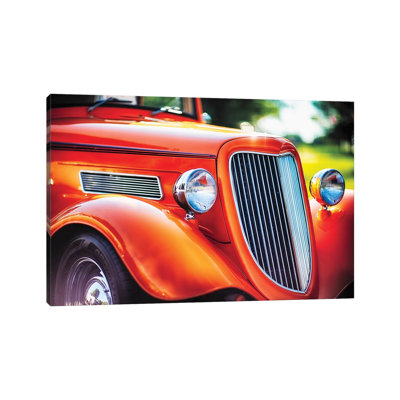 Chrome And Smooth Curves Of A Roadster by George Oze - Wrapped Canvas Print