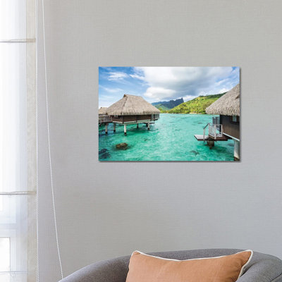 Overwater Villas On Moorea, French Polynesia by Jan Becke - Wrapped Canvas Print