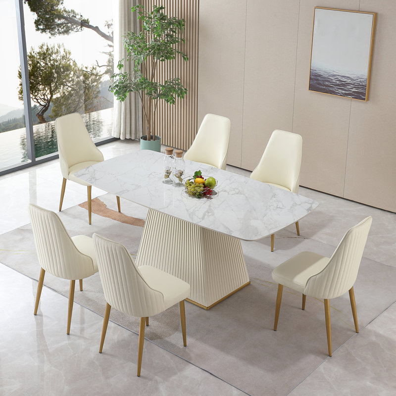 Table de salle à manger contemporaine en pierre frittée avec piédestal carré et 6 chaises.