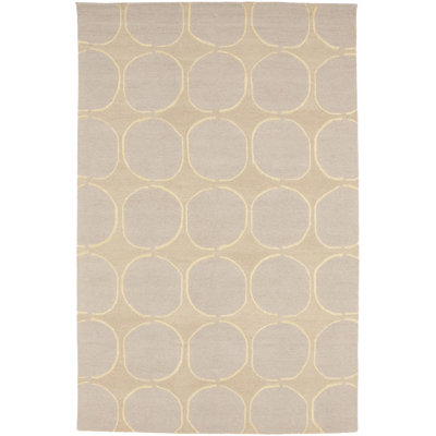 Tapis beige rectangulaire en laine touffeté à la main