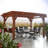 Backyard Discovery Ashland 14' x 10' Cedar Wood Outdoor Patio Pergola Kit with Trellis Roof and Built-In Bar Top