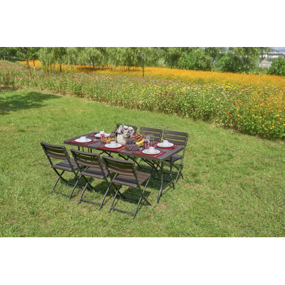 Brooxie 4 - Person Patio Dining Set with Rectangular Table