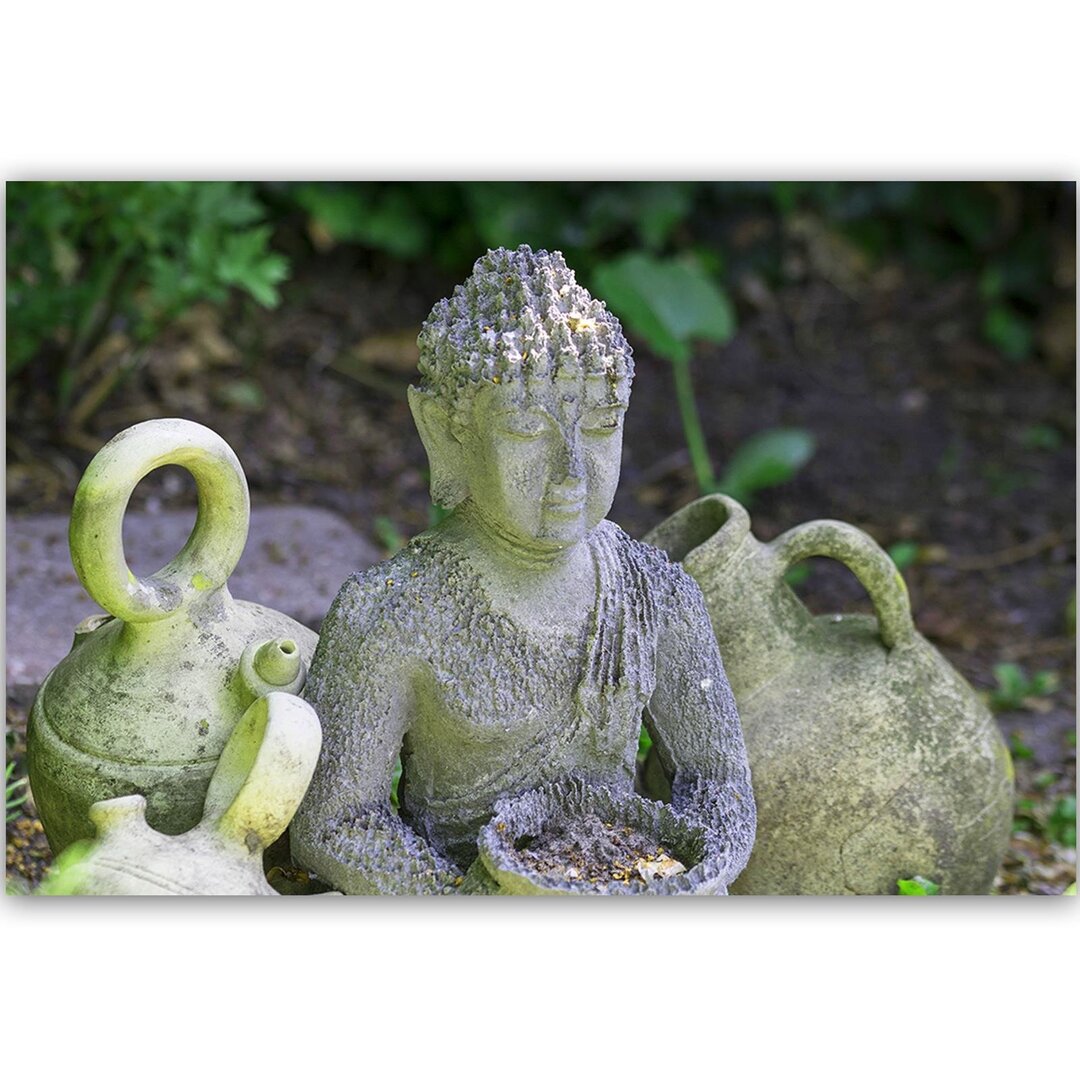 Leinwandbild Buddha mit Geschirr