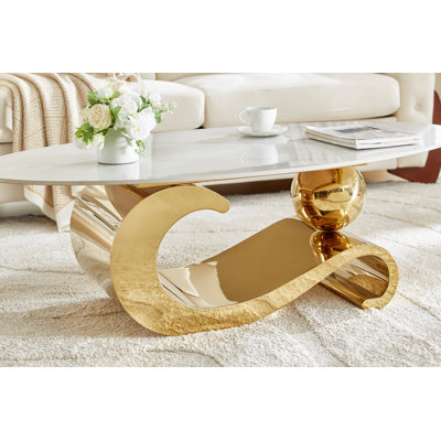 Table basse en métal doré avec plateau en faux marbre
