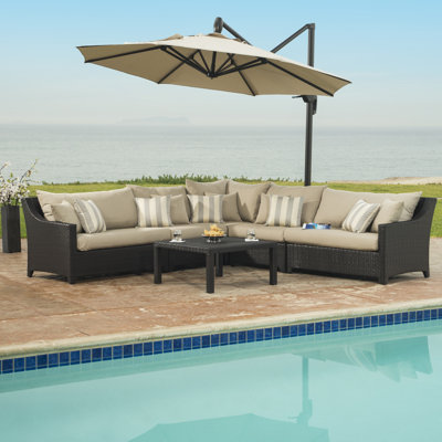 Ensemble de conversation modulaire en rotin 7 pièces avec housses de coussin en Sunbrella Fionnula