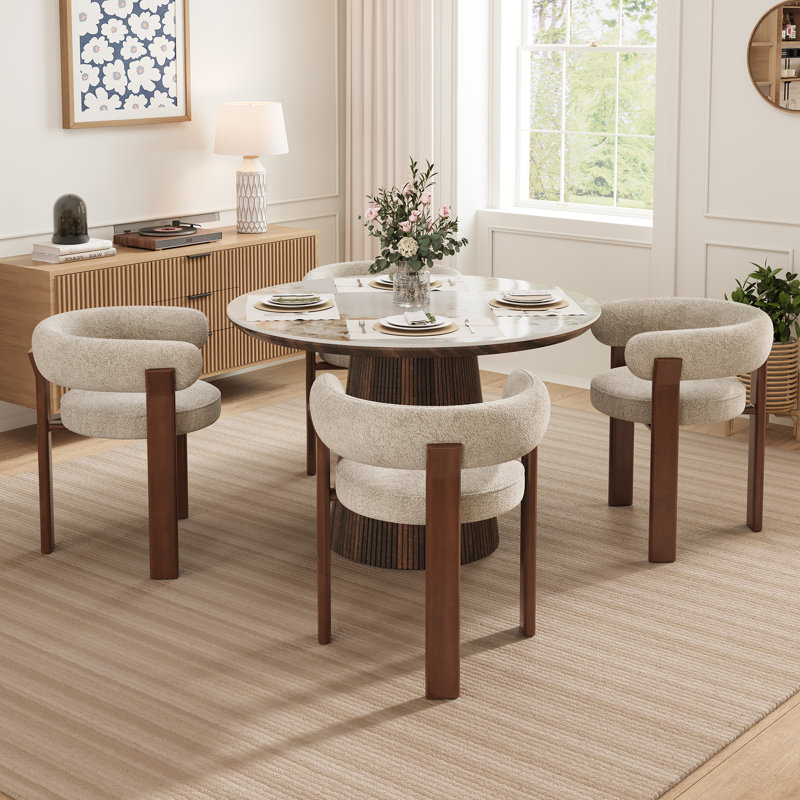 Ensemble de table et de chaises Adwin pour 4 personnes, comprenant une table ronde de 120 cm et 4 fauteuils rembourrés à motif ours en peluche.