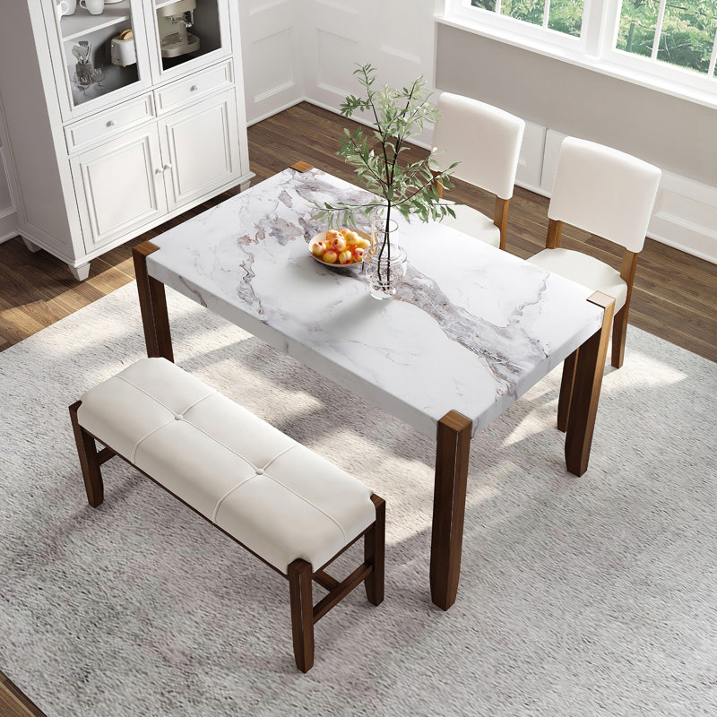 Ensemble de mobilier de salle à manger moderne 4 pièces avec table en faux marbre et conception compacte, parfait pour les repas de famille et une utilisation polyvalente