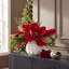 Holiday Magnolia Arrangement with Evergreen and Berries in Decorative Ceramic Vase