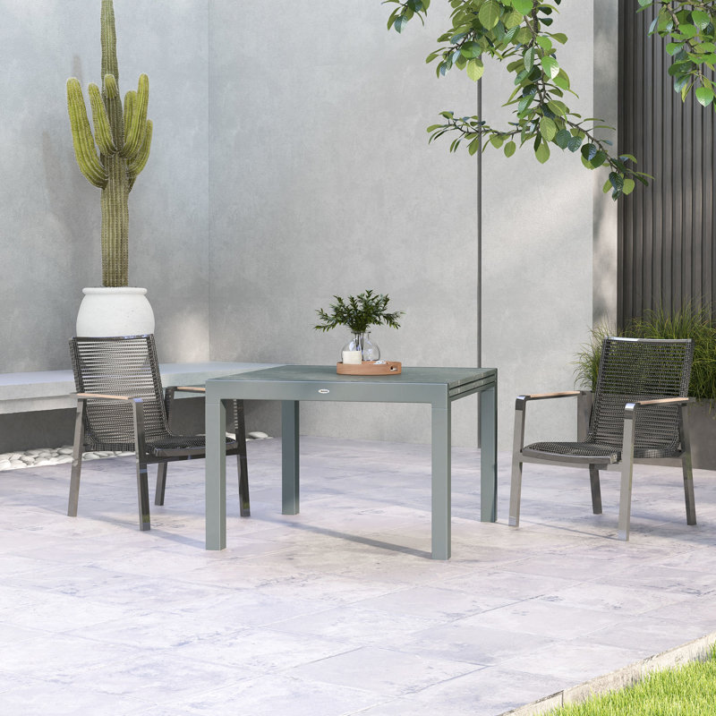 Table de salle à manger extensible pour patio, gris foncé, 104 cm à 211 cm, structure en aluminium et plateau en acier imitation bois. Table extensible de 183 cm à 211 cm avec plateau.