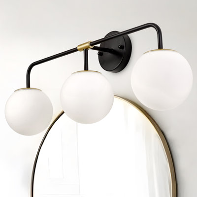 Éclairage pour meuble-lavabo sphérique à trois lumières