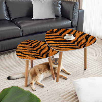 Ensemble de 2 tables basses gigognes triangulaires et transparentes en tigre noir et noir