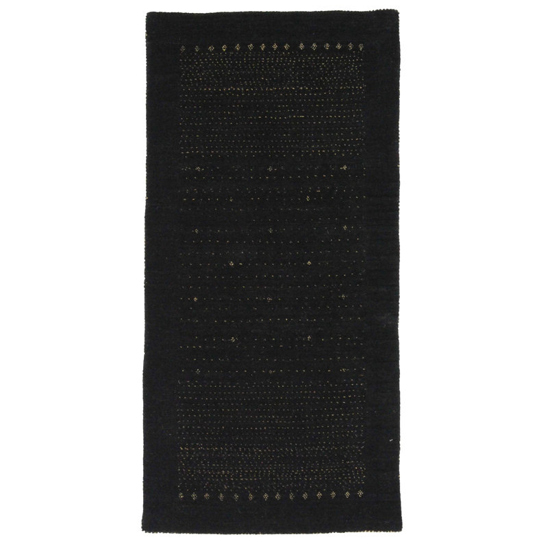 Ovide Polka Dots Area Rug in Black