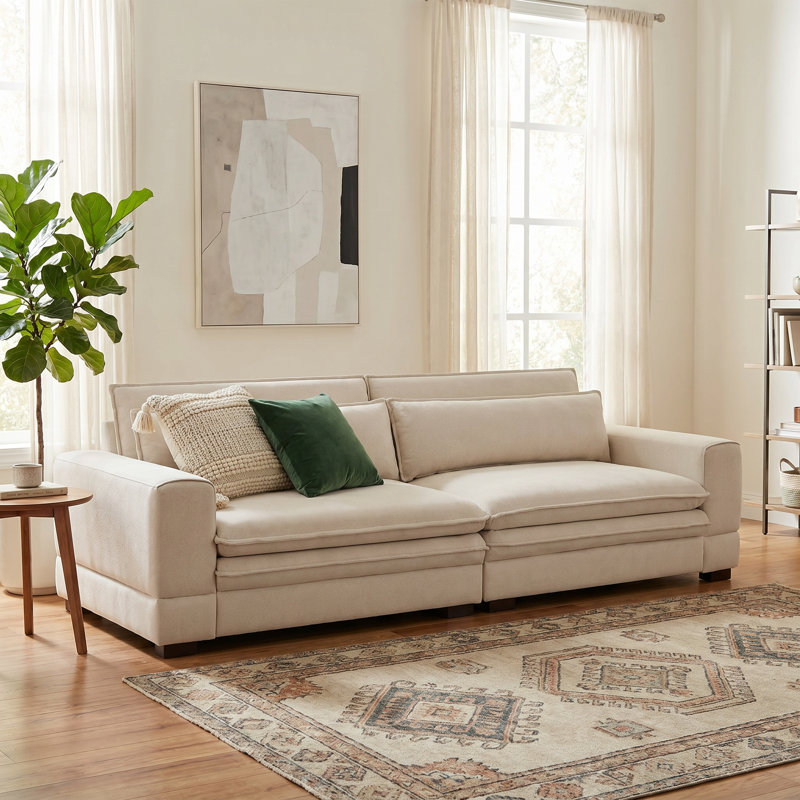 Le canapé moderne de style Mid-Century (beige) rehausse l'ambiance de la maison, idéale pour les rassemblements en appartement et la détente dans la chambre à coucher