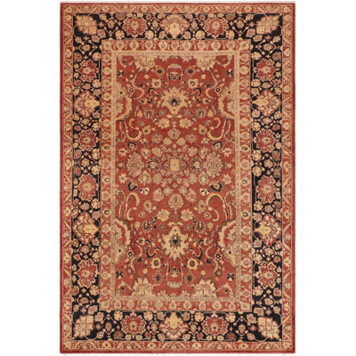 Tapis rectangulaire en laine noué à la main à motif floral de 10 pi 2 po x 13 pi 9 po Hannah