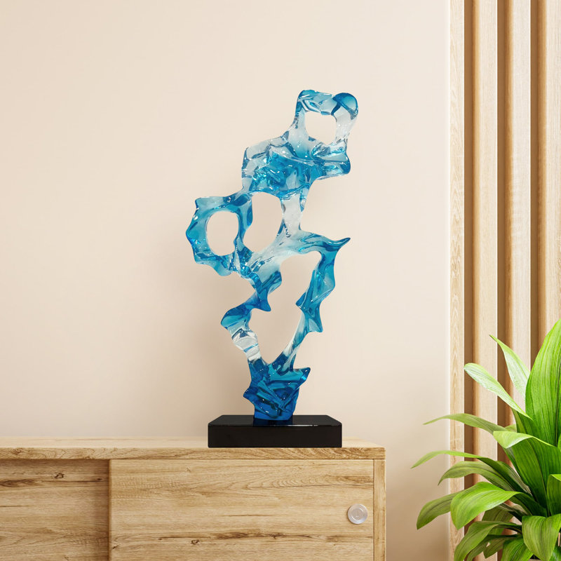 Sculpture en résine transparente bleue