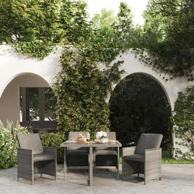 Krunal 4 - Person Patio Dining Set with Rectangular Table