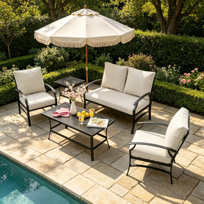 Ensemble de patio extérieur en métal pour 4 personnes avec deux tables et coussins Nickita
