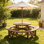 Table de pique-nique ronde pour 12 personnes, ensemble de salle à manger de patio en bois massif, structure stable, bricolage avec trou pour parasol