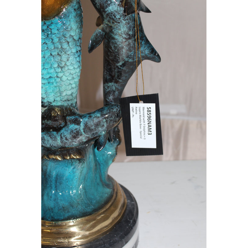 Statue sirène Healy avec sept dauphins