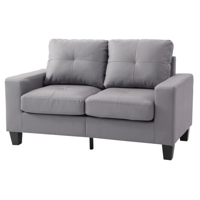 Causeuse décontractée polyvalente et confortable avec accoudoirs fins, parfaite pour les soirées cinéma relaxantes et les conversations intimes à la maison