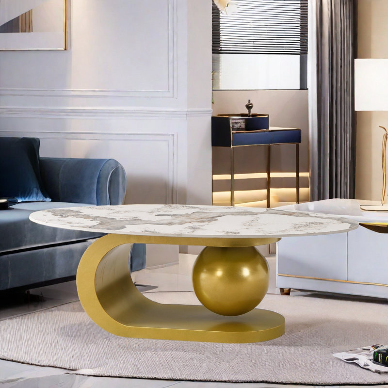 Table basse ovale avec motif en marbre fritté et base en acier inoxydable doré