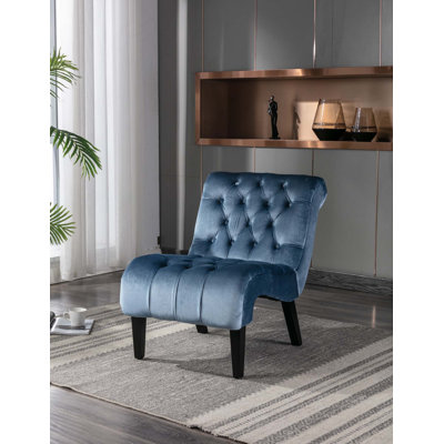 Fauteuil d'appoint sans accoudoirs en velours avec capitonnage et pieds en bois robustes