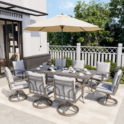 Freada 8 - Person Patio Dining Set Umbrella Hole Included Rectangular Table with Cushions Included