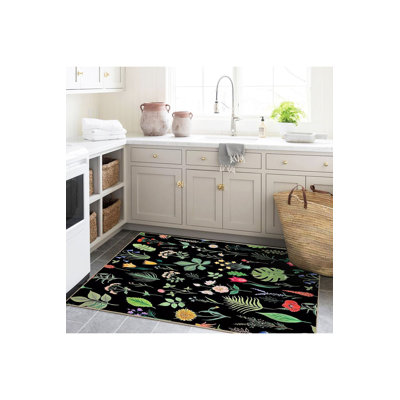 Tapis noir lavable à motif floral noir