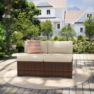 Chaise d'extérieur sans accoudoirs en osier avec coussins (ensemble de 2)
