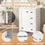 Meuble-lavabo compact en bois blanc avec lavabo en céramique, style moderne pour les salles de bain peu encombrantes