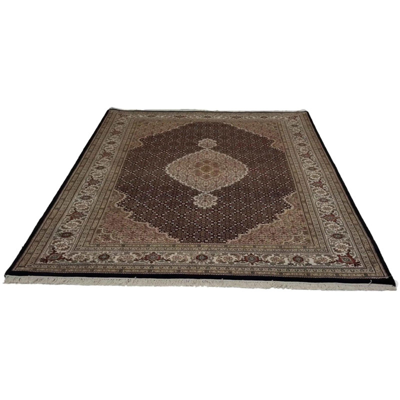 Losh Oriental Area Rug in Black
