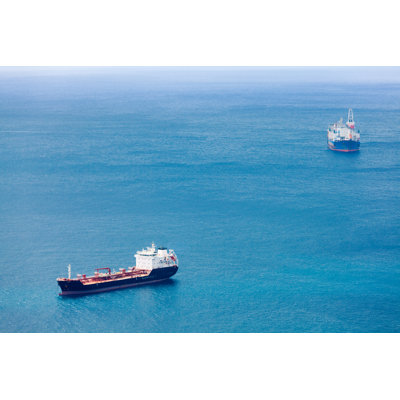 Cargo Ships on The Ocean by Zodebala