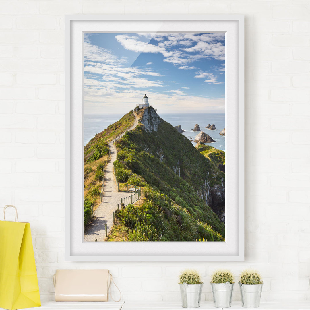 Gerahmtes Papierbild Nugget Point Leuchtturm und Meer Neuseeland