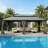 Outdoor Patio Metal Frame Gray Wood Grain Resin Roof Gazebo with Privacy Curtain Mosquito Netting-121781435-118232585