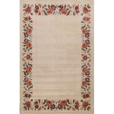Tapis beige / rouge en laine touffeté à la main Tryphosa