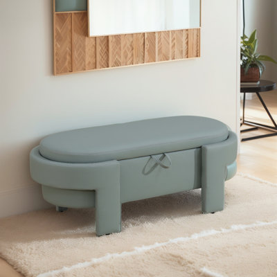 48" Wide Faux Leather Tufted Oval Storage Ottoman