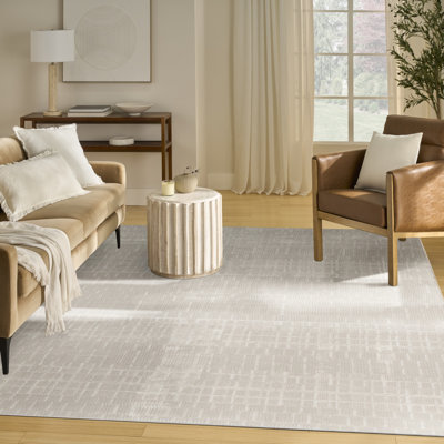 Tapis d'intérieur moderne ivoire Ebern Designs Reimann