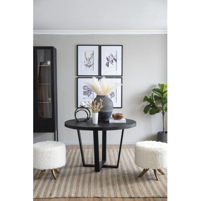 Table de salle à manger ronde de 119 cm (47 po), en bois d'acacia et fer, monobloc, noire, pour 4 personnes, piètement croisé.