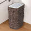 Poubelle compacte en osier avec couvercle pour un contrôle supérieur des odeurs et une efficacité d'espace dans les petites pièces-118512211