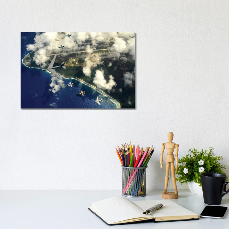 A B-52 Stratofortress Leads A Formation Of Aircraft Over Guam II by Stocktrek Images - Wrapped Canvas Print