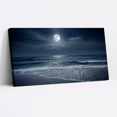 Ensemble de 1 tableau sur toile représentant un océan au clair de lune