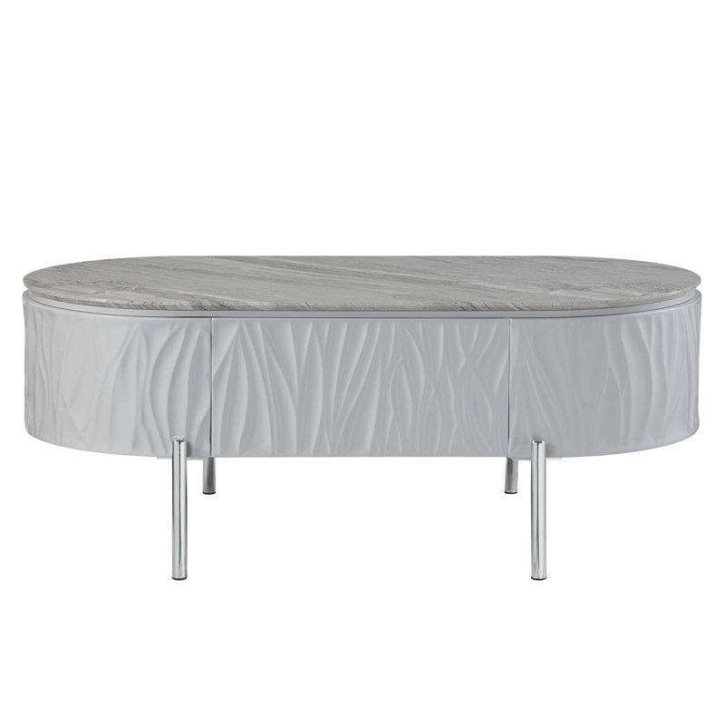Table basse polyvalente grise avec pattes en métal lustrées et pieds élégants