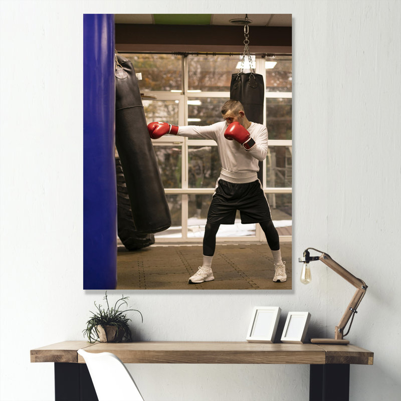 Vue latérale d'un boxeur qui pratique avec un sac de boxe, H 20 po x l 12 po x P 1 po, Toile tendue