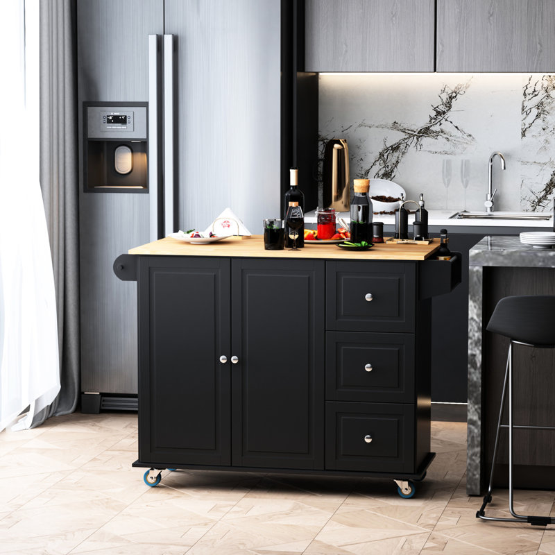 Îlot de cuisine mobile avec abattant. Chariot de rangement noir 3 tiroirs, armoire 2 portes, porte-serviettes / porte-épices. Pratique et fonctionnel