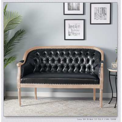 Elegant French Country Upholstered Sofa with Deep Button Tufting and Mosaic Decor, Perfect for Sophisticated Living Spaces.
