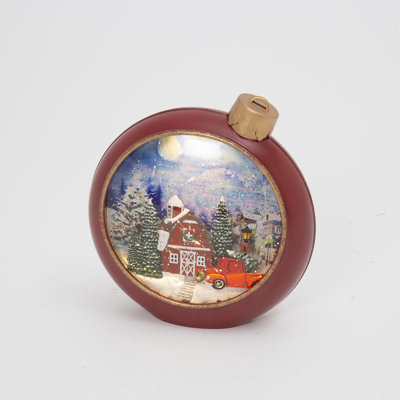 Snow dusted 8.3 in H Battery Operated Lighted Musical Holiday Village Scene Spinning